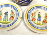 two plates that are sitting on a table