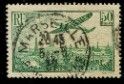 a stamp with a picture of a man and a dog on it
