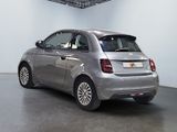 a silver car that is parked inside of a building