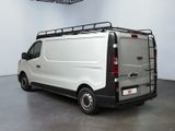 a white van that is parked in a room