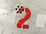 a close up of a number two painted on a metal surface