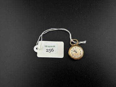 a close up of a watch with a price tag attached to it