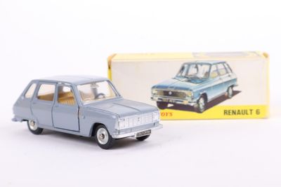 a toy car that is sitting in front of a box