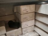 many boxes on the shelves in the room
