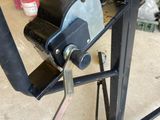a machine that is sitting in the garage on the floor