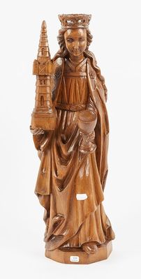 une statue en bois représentant une femme tenant un oiseau et un château