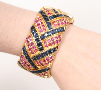 an image of a close up of a person ' s wrist with a bracelet on it