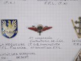 many different badges on a piece of paper with writing