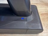 a close up of a vacuum cleaner on a wooden floor