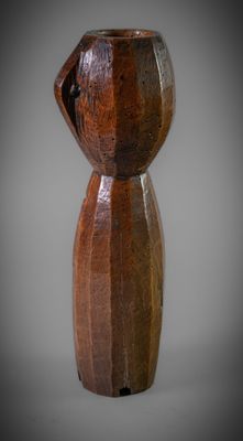 a wooden vase that is sitting on a table