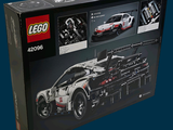 a box with a lego model of a race car in it