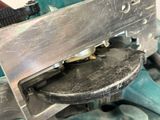 a close up of a machine that is being worked on