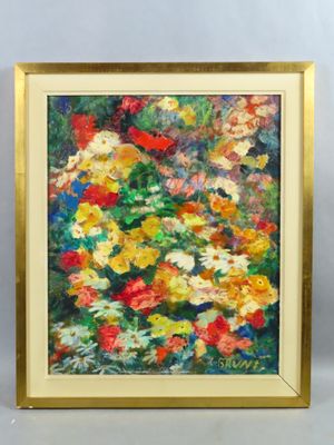 un tableau représentant un bouquet de fleurs dans un cadre doré