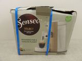 a box that has a coffee maker inside of it