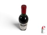 a bottle of wine that is sitting on a table