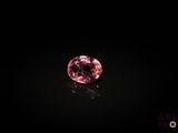 a pink diamond in the dark
