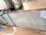 a machine that is sitting on the counter in the kitchen