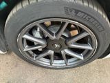 a close up of a tire on a car ' s rim