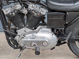 a close up of a motorcycle parked in front of a building