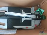 a box with a stapler and a stapler on top of it