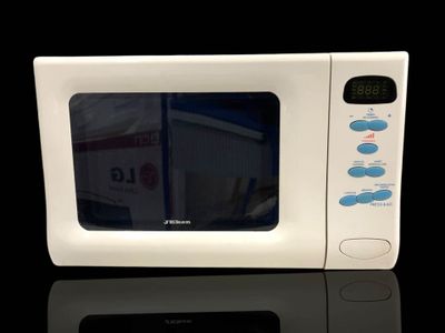 four à micro-ondes JEKEN. Dans son carton d'origine - Photo 1