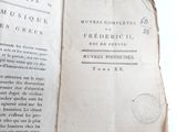 an open book with a picture of a bird on it