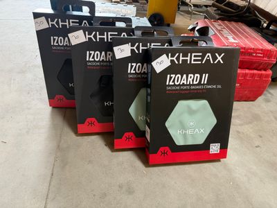 three boxes of khexa headphones are sitting on the floor
