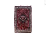 une image représentant un tapis rouge et noir sur fond blanc