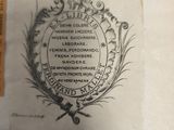 a label on a piece of paper with a picture of a coat of arms