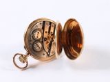 an image of a pocket watch with a chain on a white background