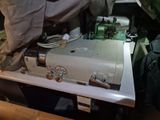 a sewing machine that is sitting on a table