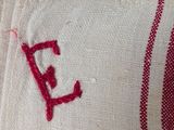a close up of a piece of fabric with a letter e on it