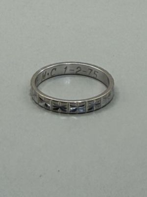 an image of a wedding ring with a date on it
