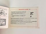 a person holding a book open to a page