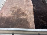 an image of a truck bed with dirt in it