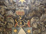 painting of a coat of arms with a cross and a star on it