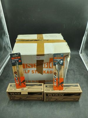 two boxes of wood sit on the floor next to each other