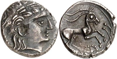 a silver coin with an image of a woman and a horse on it