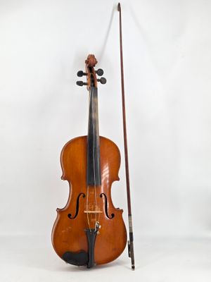 an old violin with a bow and bow rest on a white background