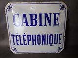 a blue and white sign that says cabin telephone