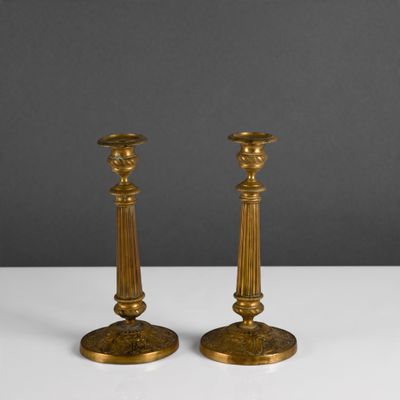 pair of antique brass candlesticks