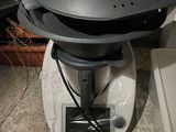 an image of a black and white blender with a lid on it