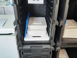 a stack of plastic containers sitting on top of each other
