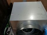a box that has a washing machine inside of it