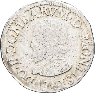 a close up of a coin on a white background