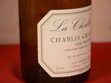 a bottle of wine that is sitting on a table