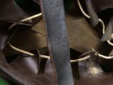 a close up of a helmet on a green plate