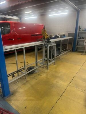 a red truck that is parked in a garage