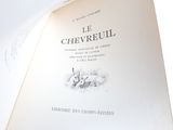 an open book with a picture of a rabbit on it