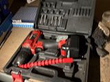 a tool box with tools in it on a table